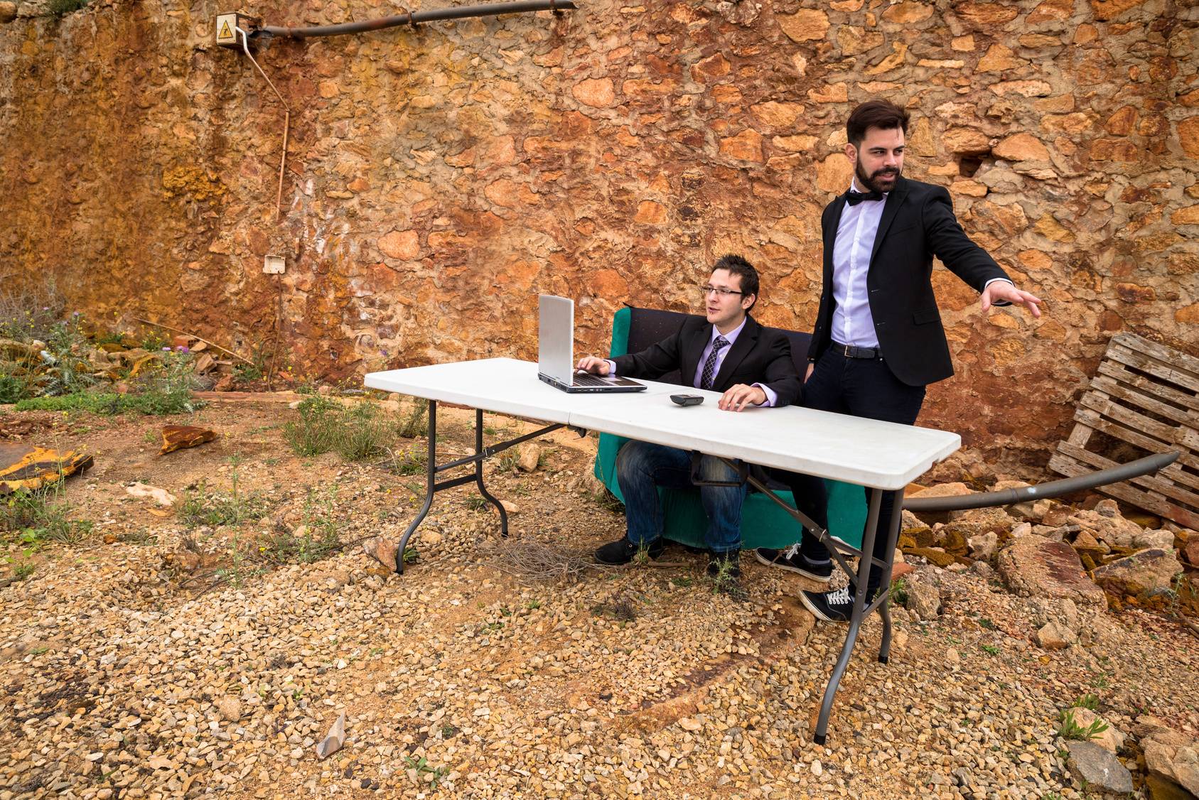 Two young guys working in a grunge officet