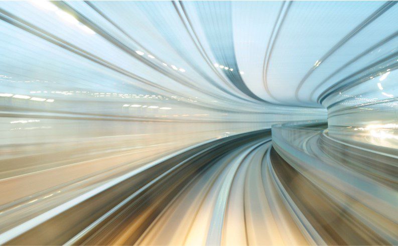 Subway underground tunnel with blurry rail tracks in metro gallery