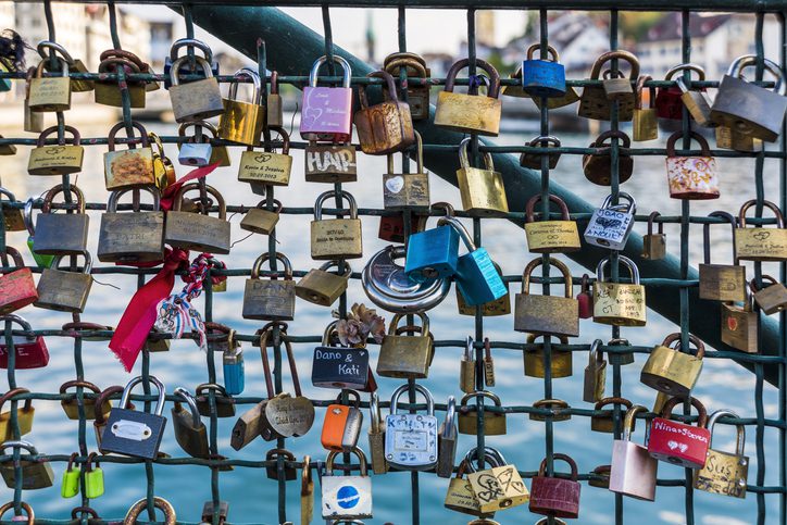 Love Padlocks hanging on old bridge in Zurich, Switzerland