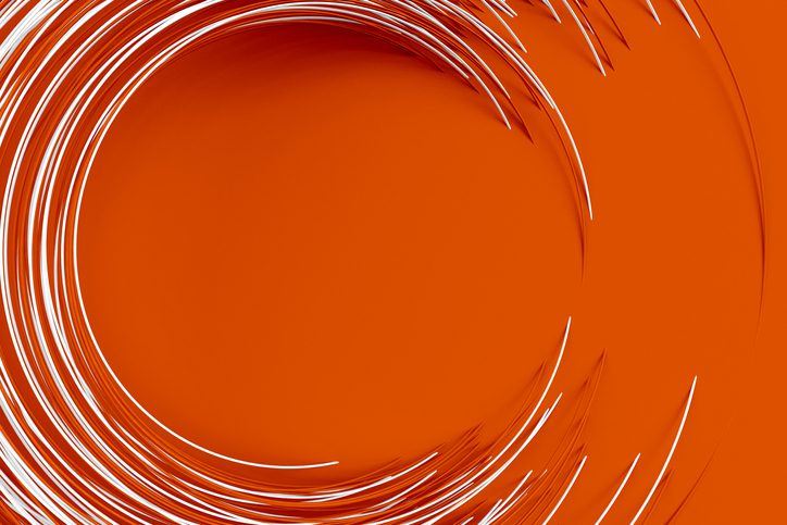 Digital background of many orange circles rotated at different angles and forming a frame around an empty space 3D illustration