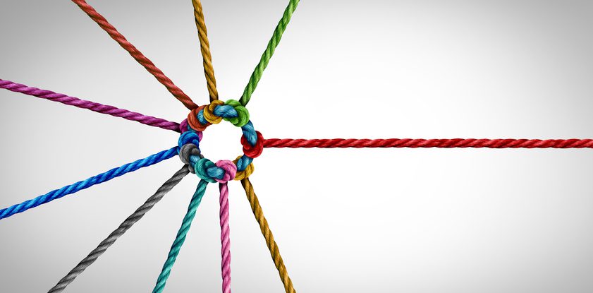 ropes connected together as a corporate network symbol for cooperation and working collaboration.