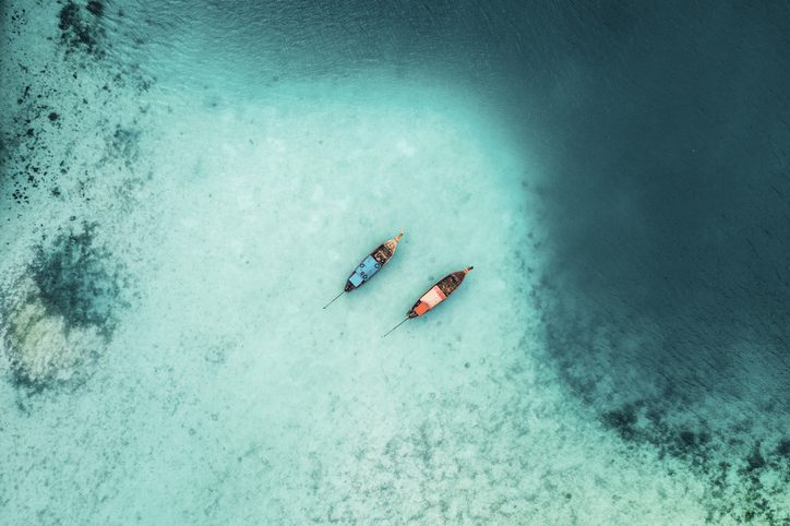 Scenic aerial view of two boats on sea near Koh Phi Phi, Thailand