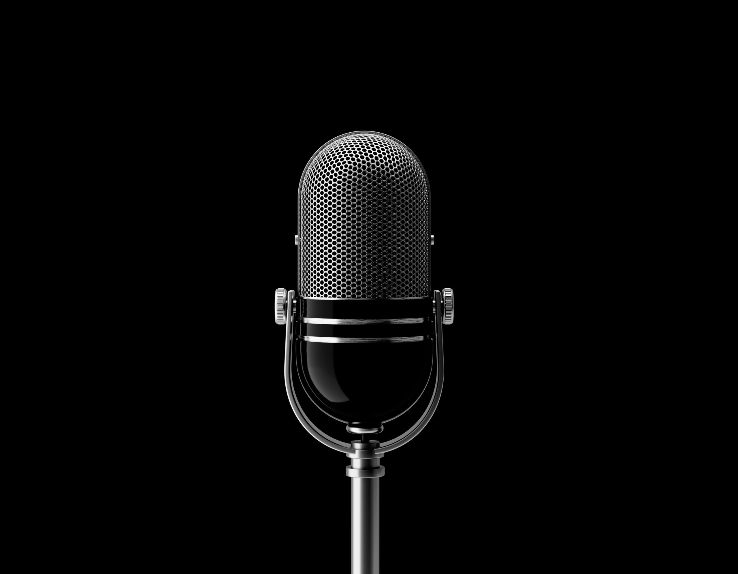 Microphone on black background. Horizontal composition with copy space. Clipping path is included.