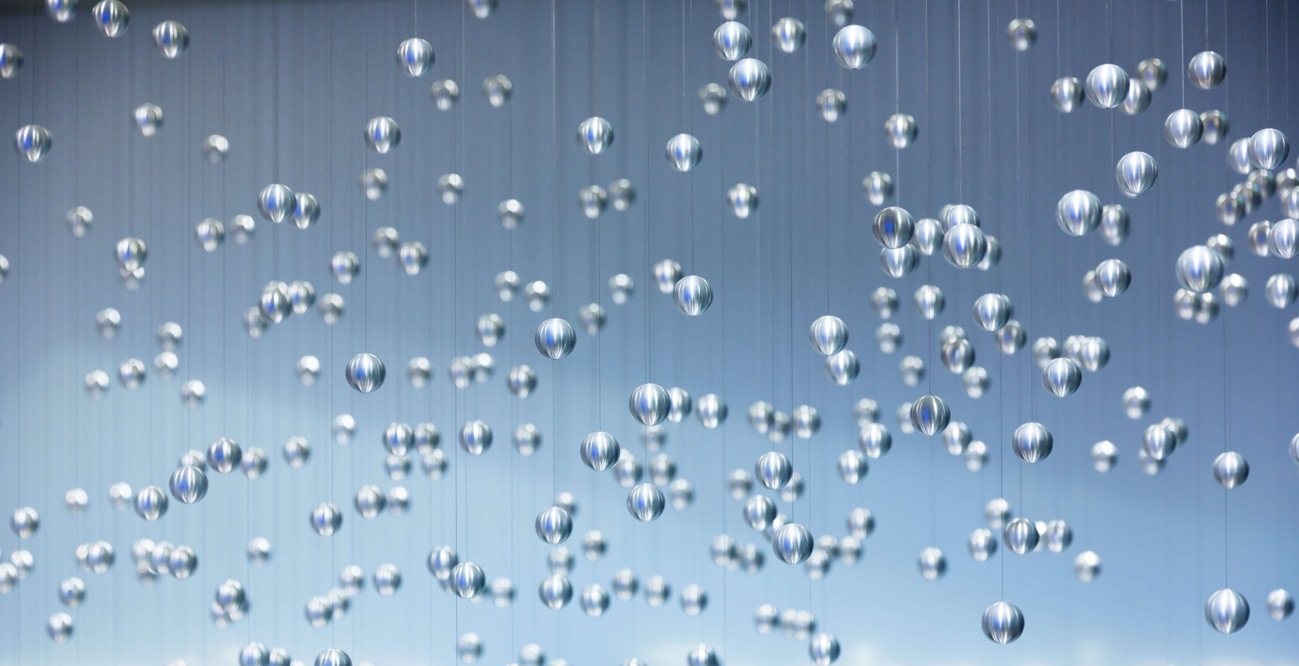 NASAA - Reg BI - Bubbles rising on blue background