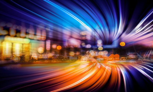 Blurred traffic image represents AT technology and speed of implementation in wealth management