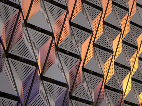 Orange building exterior represents CAT compliance structure