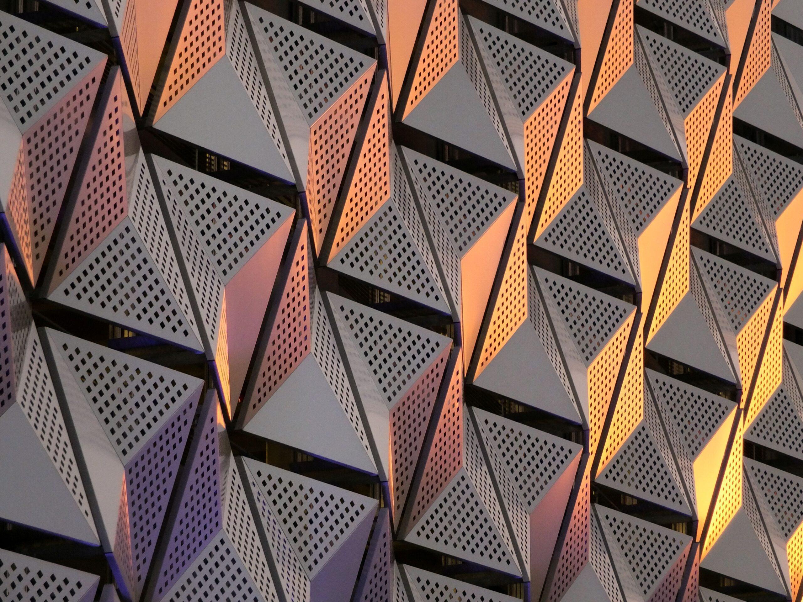 Orange building exterior represents CAT compliance structure