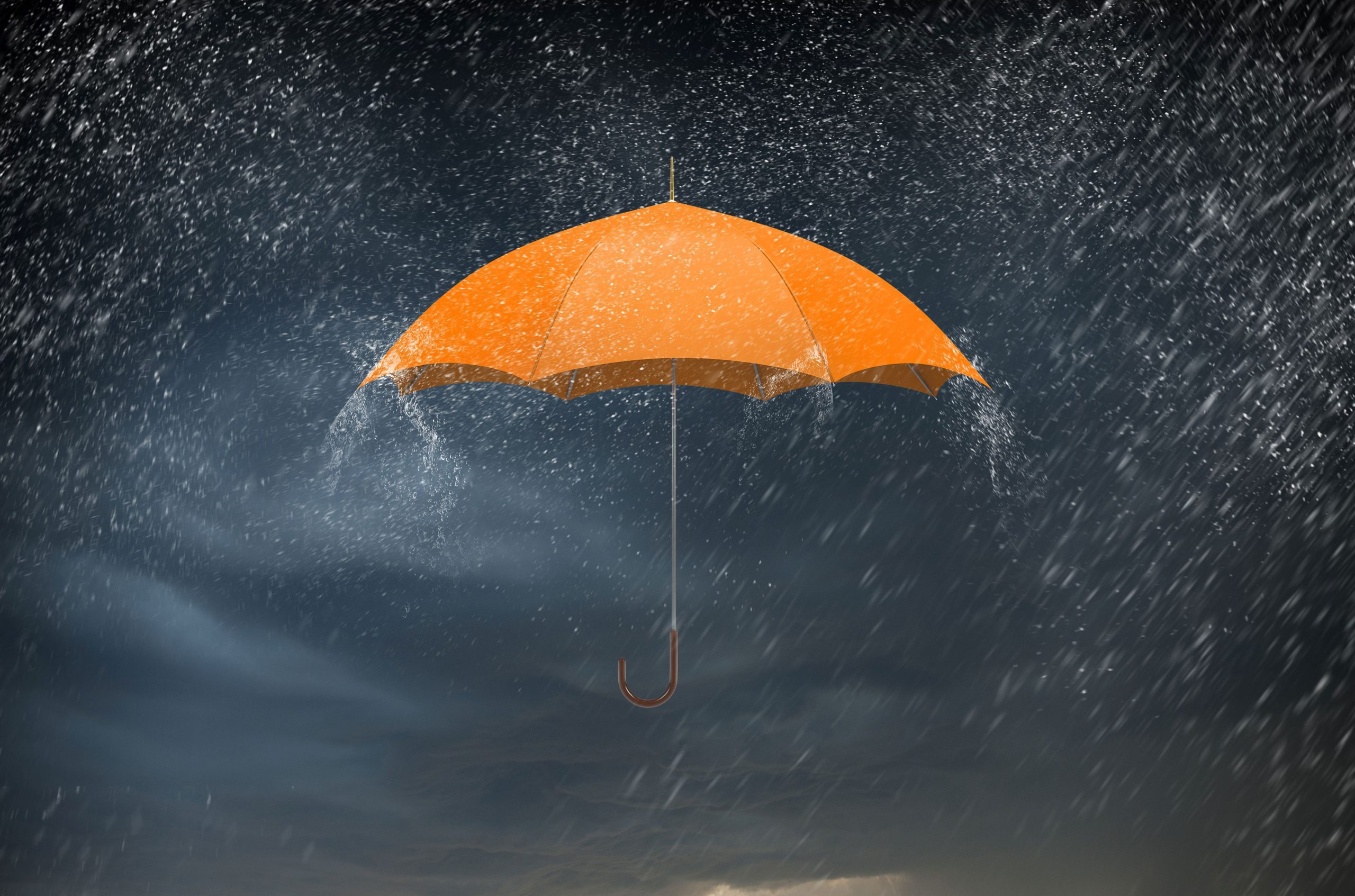 orange umbrella in rain represents protecting Vulnerable adults